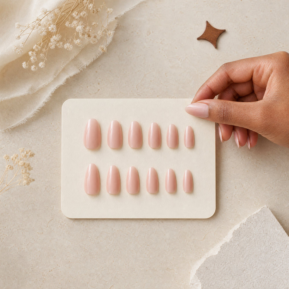 A blush press-on nail sizing set arranged for choosing the right fit